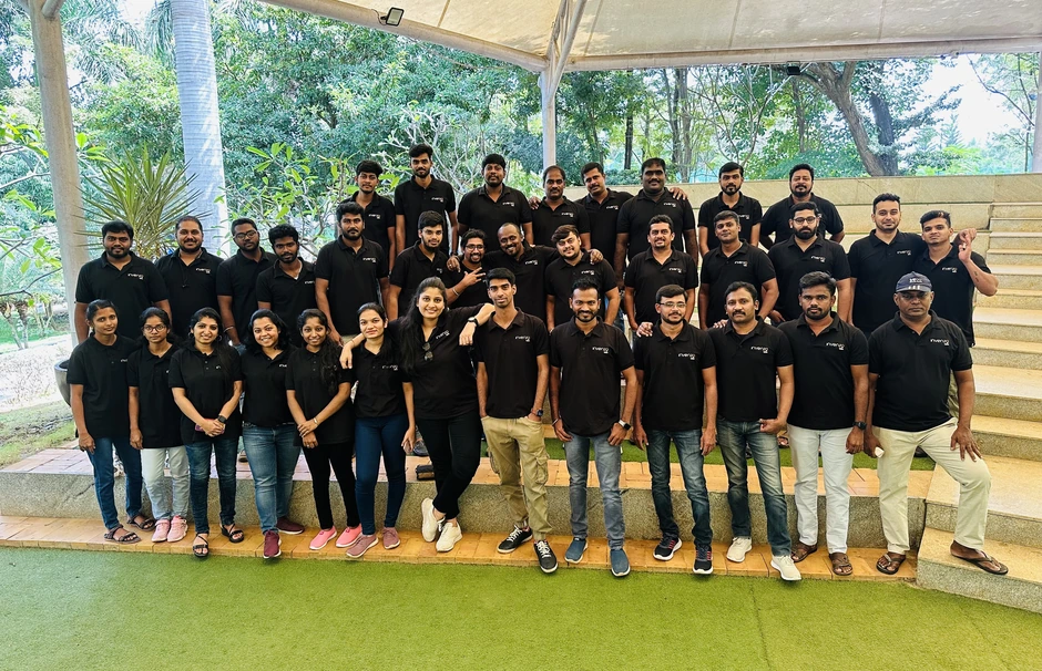 The Invenzo Labs team together outdoors in branded shirts